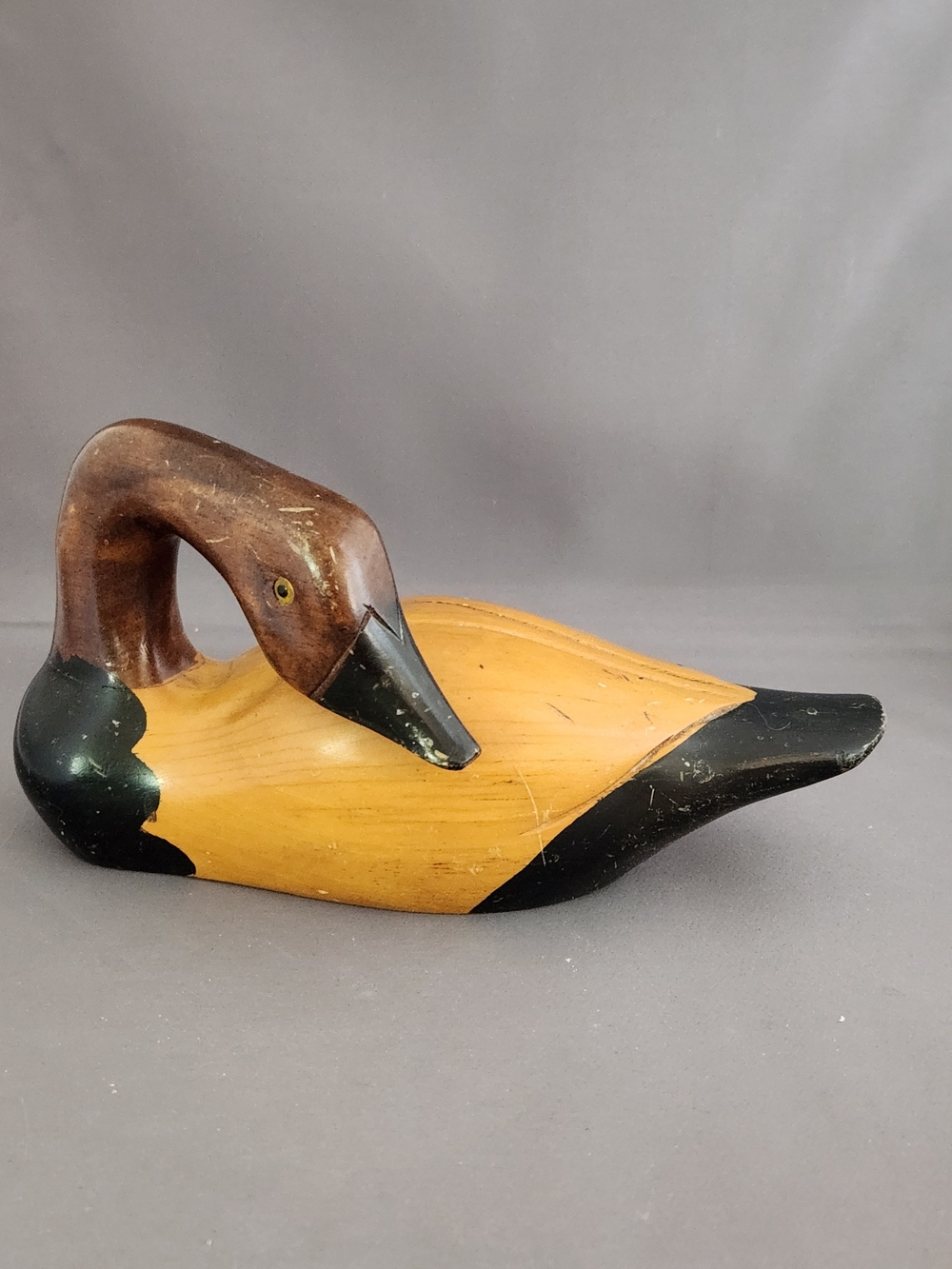 Hand-Carved Wooden Duck Decoy in Brown and Black